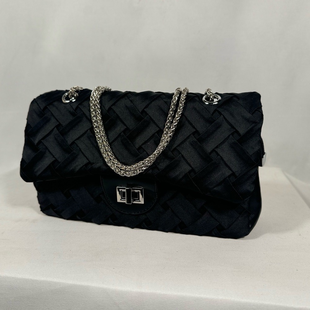 Beautiful two way black satin cross weave flap with magnetic close.